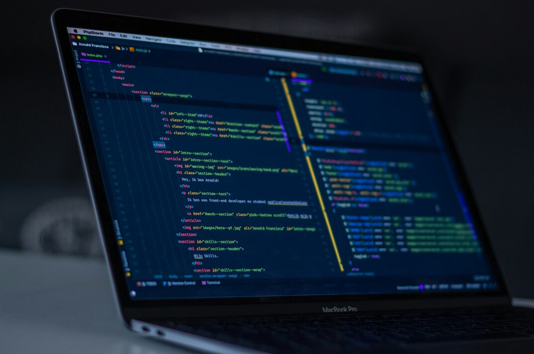 beginner coding on laptop