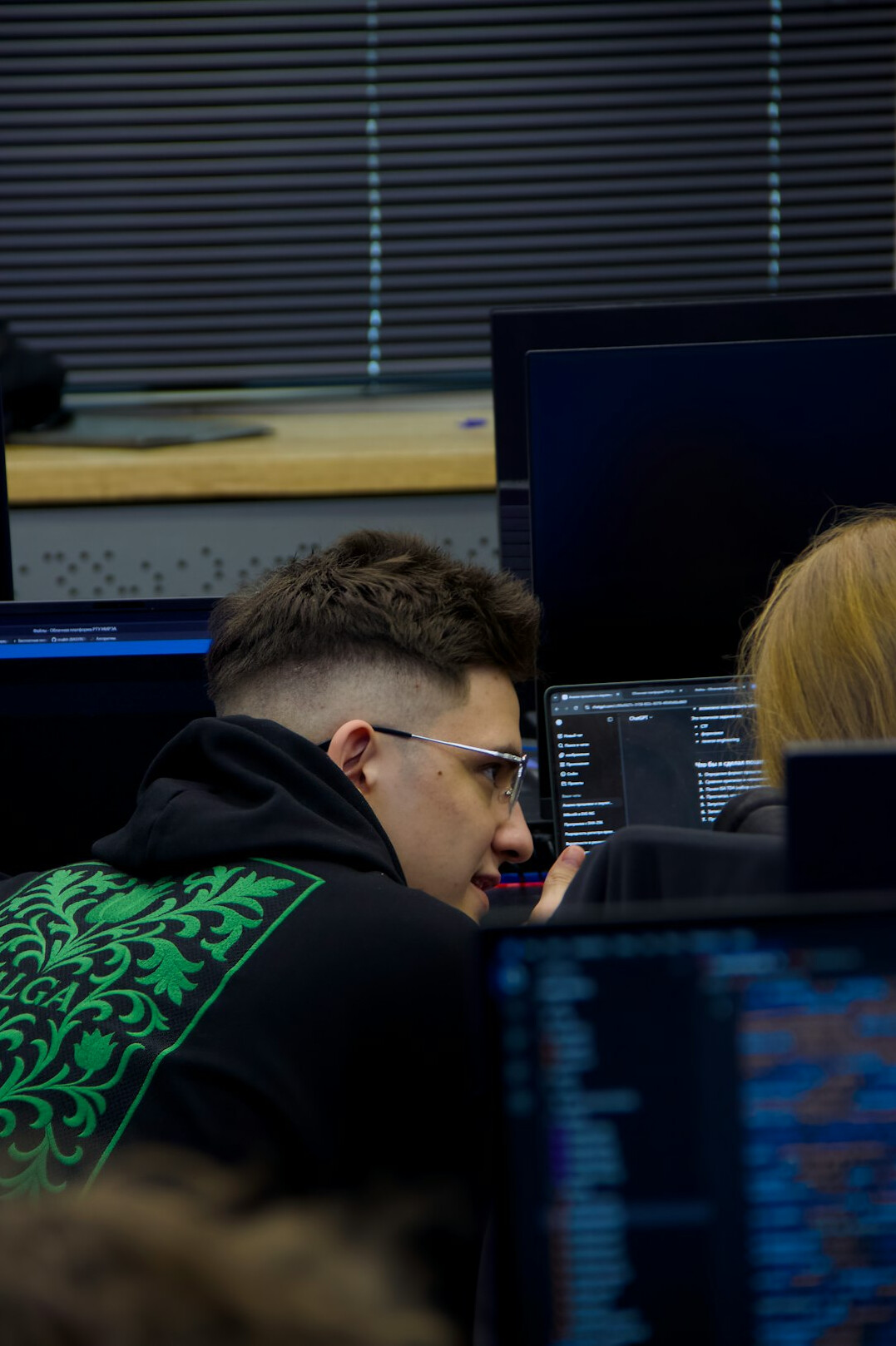 group of students coding together