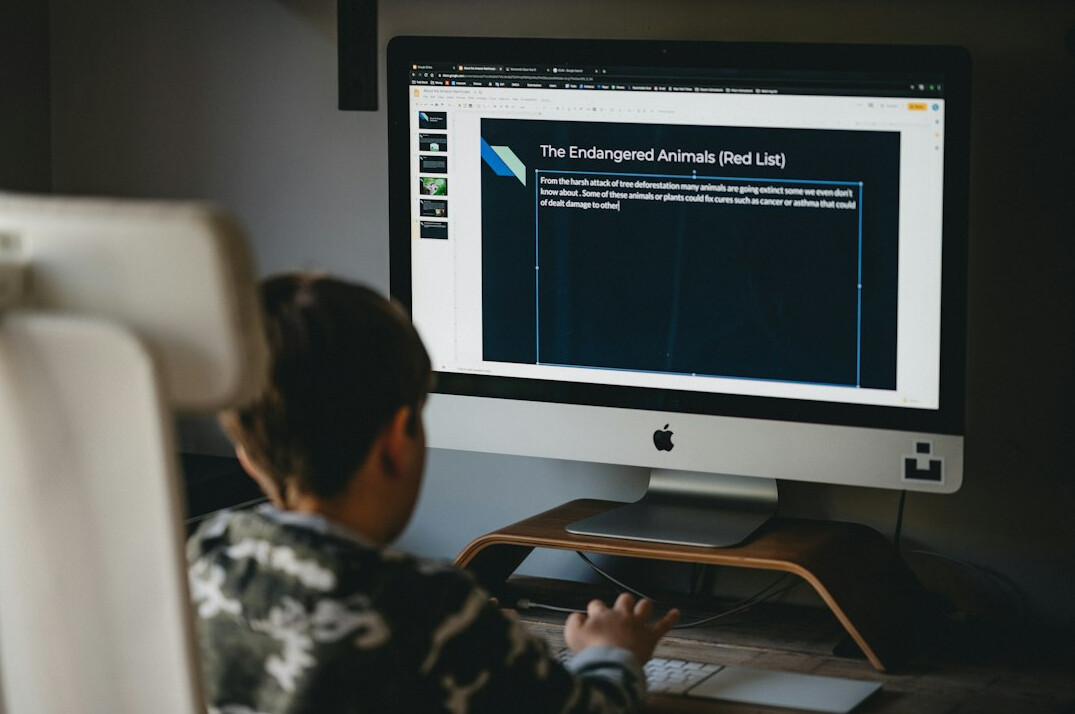 student learning to code at home