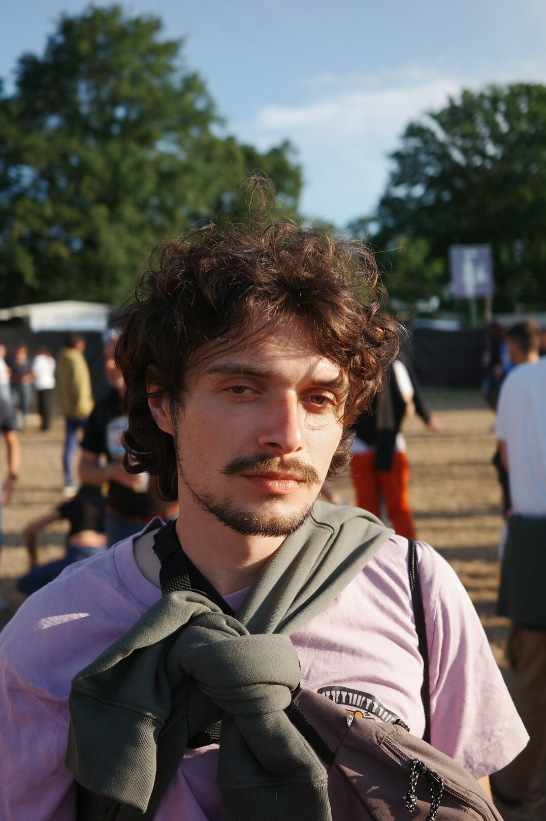 Portrait of a man with a short beard looking at the camera