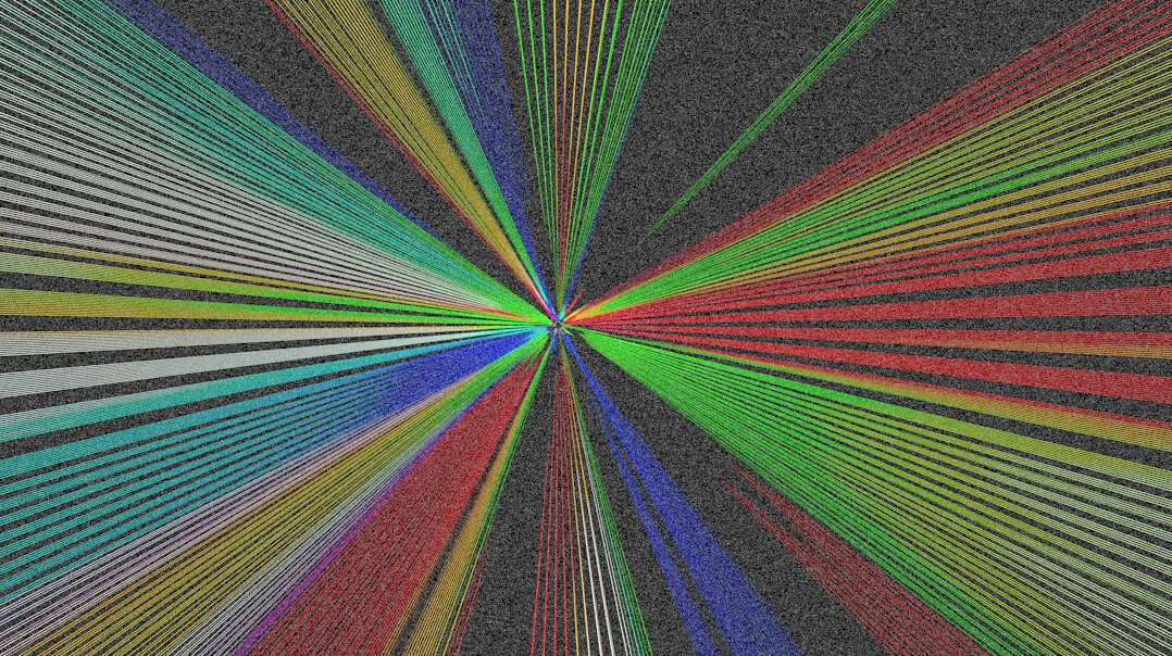 Monitor displaying lines of colorful programming code