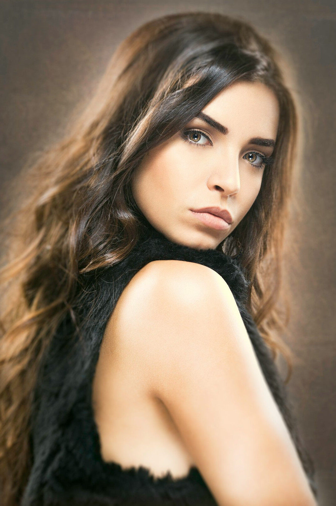 Portrait of a young woman with long hair