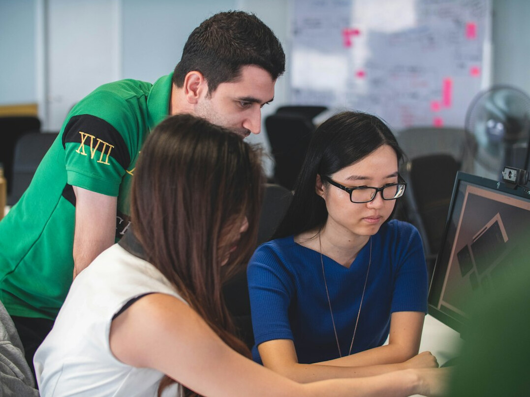 diverse group studying coding