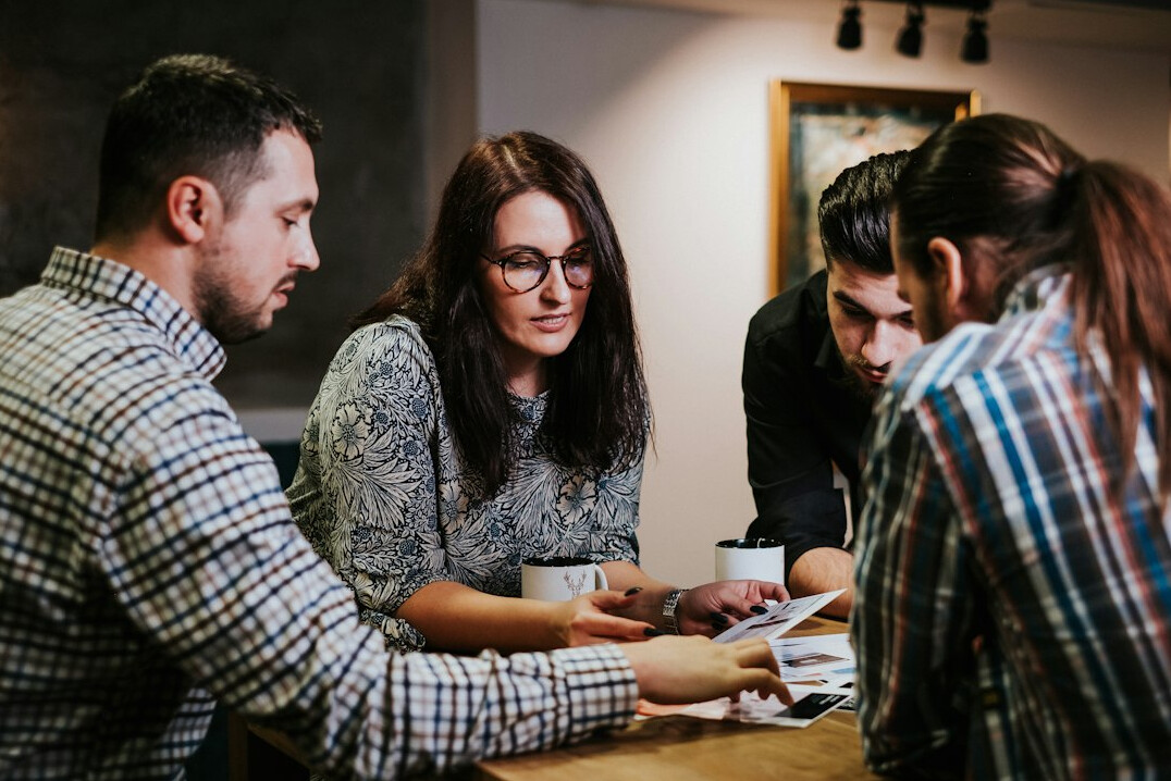 group of programmers in meeting